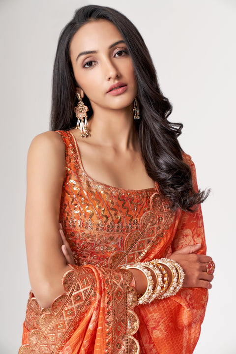 Orange Heavy Floral printed sequins embroidered Indian saree with four side heavy embroidered lace border