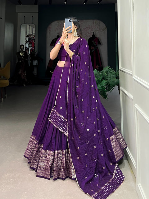 Dark Purple Crafted for Grace and Beauty: Pure Chanderi Plain Lehenga with Intricate Zari Work Border, Accompanied by Sequin Embellished Dupatta For Women