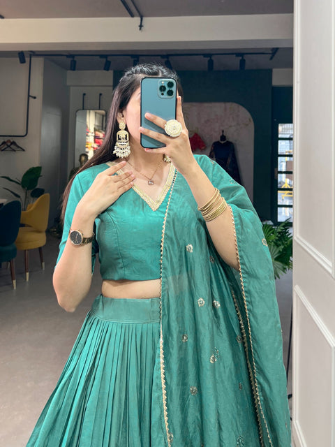 Green Crafted for Grace and Beauty: Pure Chanderi Plain Lehenga with Intricate Zari Work Border, Accompanied by Sequin Embellished Dupatta For Women