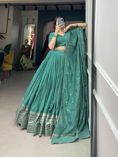 Green Crafted for Grace and Beauty: Pure Chanderi Plain Lehenga with Intricate Zari Work Border, Accompanied by Sequin Embellished Dupatta For Women