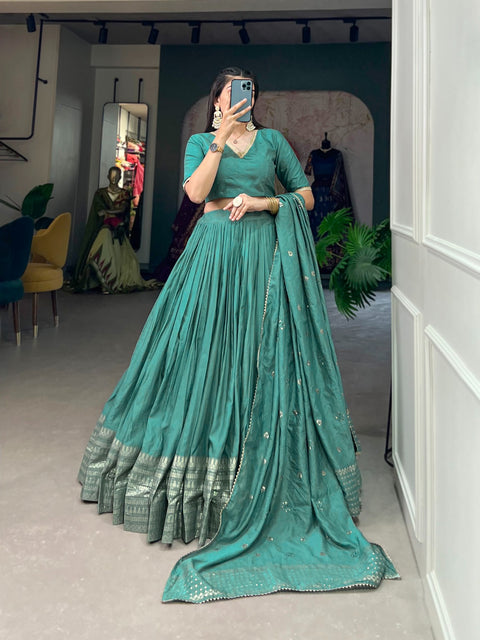 Green Crafted for Grace and Beauty: Pure Chanderi Plain Lehenga with Intricate Zari Work Border, Accompanied by Sequin Embellished Dupatta For Women