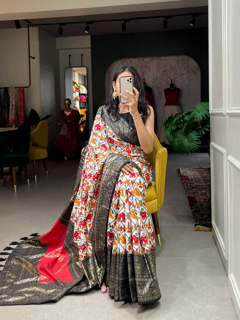 Black Dola silk sarees are known for their colourful diversity and geometric designs with patola print