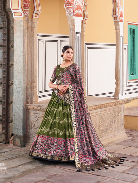 Green In the embrace of Tusser silk, adorned with Ajarakh prints, the lehenga choli