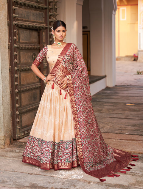 Beige In the embrace of Tusser silk, adorned with Ajarakh prints, the lehenga choli