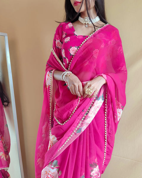 Pink saree best way to represent your classy look with this spectacular georgette printed saree with Pearl lace border