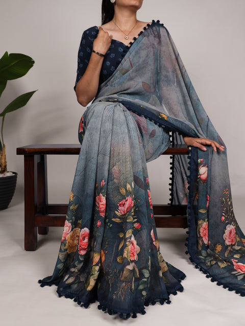 Blue Bloom in Style: Stunning Floral Print Georgette Saree with Pum-Pum Trim For Women