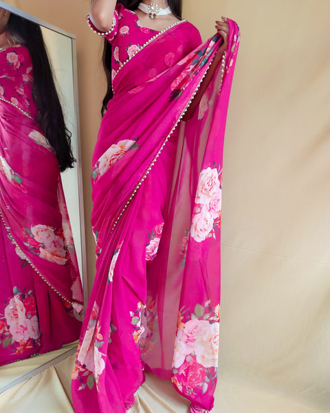 Pink saree best way to represent your classy look with this spectacular georgette printed saree with Pearl lace border