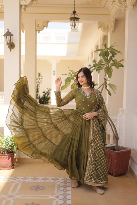 Green elegance of traditional attire with our Designer Festive Wear Gown For Woman