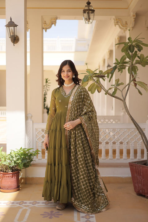 Green elegance of traditional attire with our Designer Festive Wear Gown For Woman