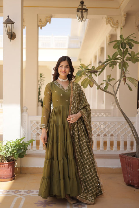 Green elegance of traditional attire with our Designer Festive Wear Gown For Woman