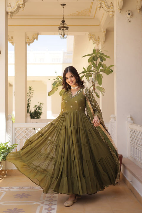 Green elegance of traditional attire with our Designer Festive Wear Gown For Woman