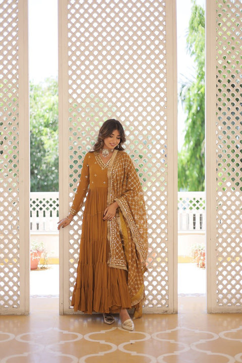 Yellow elegance of traditional attire with our Designer Festive Wear Gown For Woman