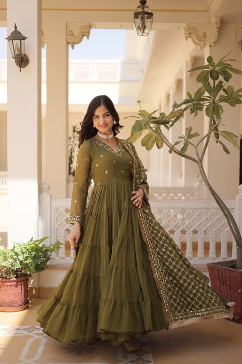 Green elegance of traditional attire with our Designer Festive Wear Gown For Woman