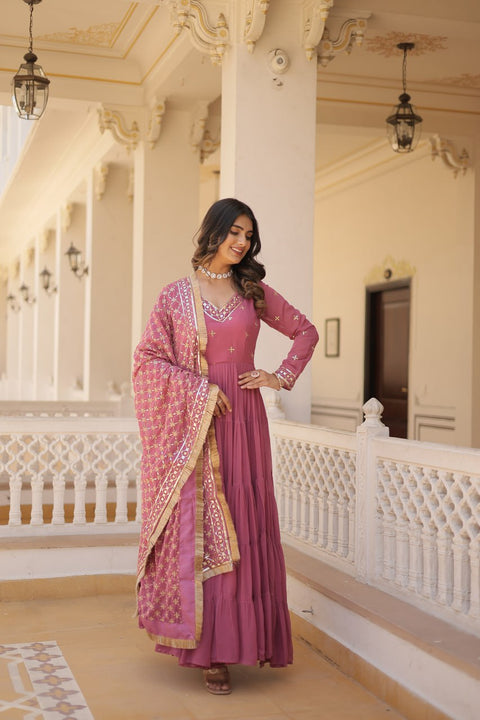 Pink elegance of traditional attire with our Designer Festive Wear Gown For Woman