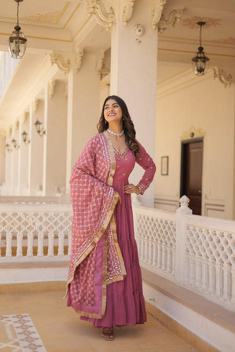 Pink elegance of traditional attire with our Designer Festive Wear Gown For Woman