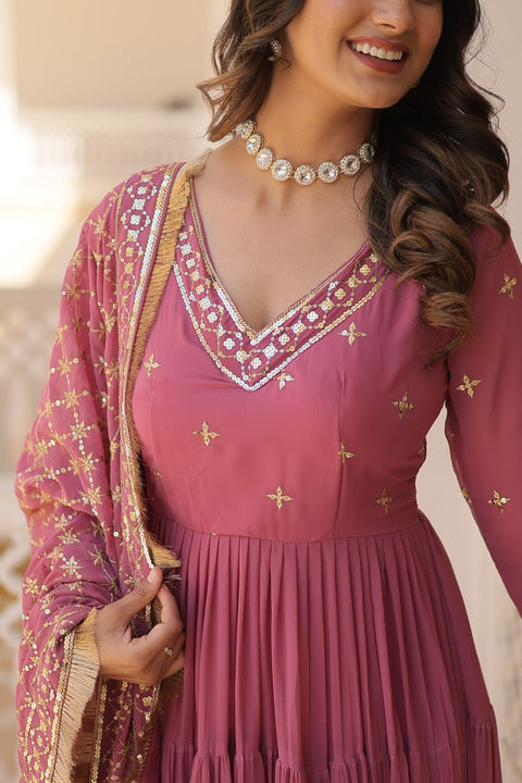 Pink elegance of traditional attire with our Designer Festive Wear Gown For Woman