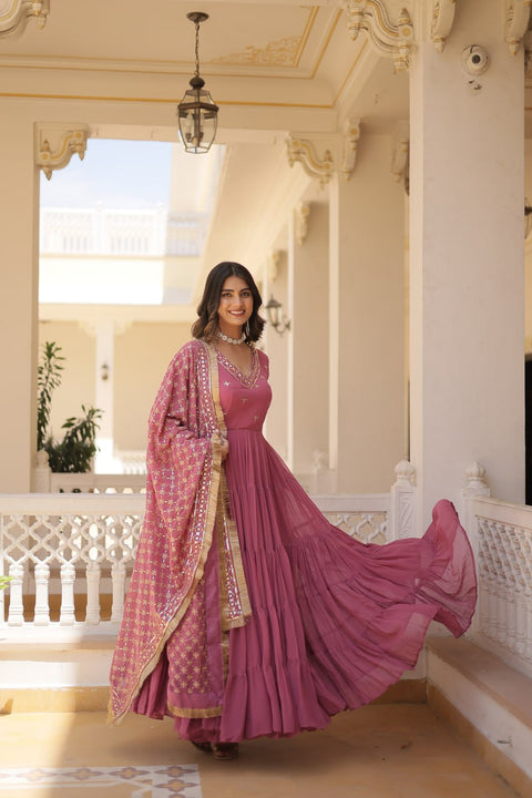 Pink elegance of traditional attire with our Designer Festive Wear Gown For Woman