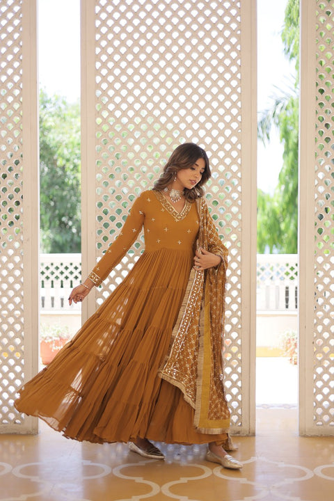 Yellow elegance of traditional attire with our Designer Festive Wear Gown For Woman