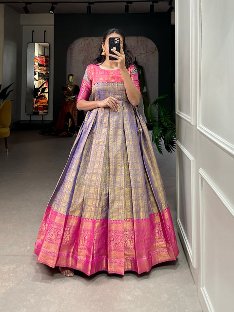 A joyful festive mood with Kanjivaram and zari weaving work appliqued gown for women