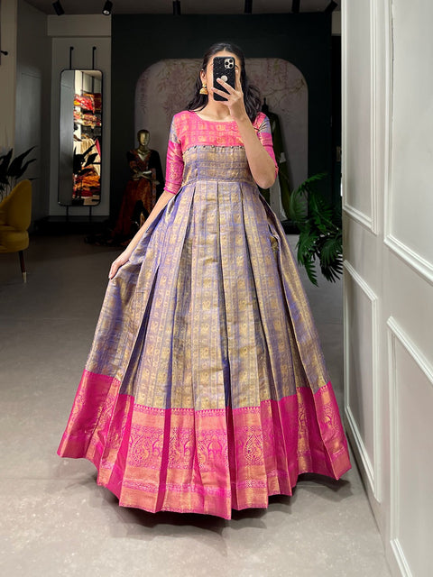 A joyful festive mood with Kanjivaram and zari weaving work appliqued gown for women