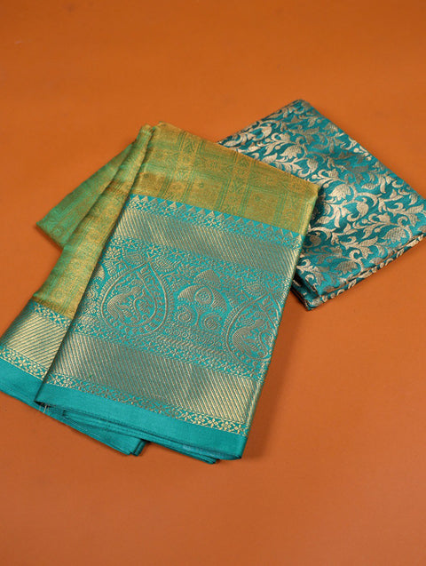 Green Kanjivaram saree embodies the epitome of timeless beauty and cultural heritage