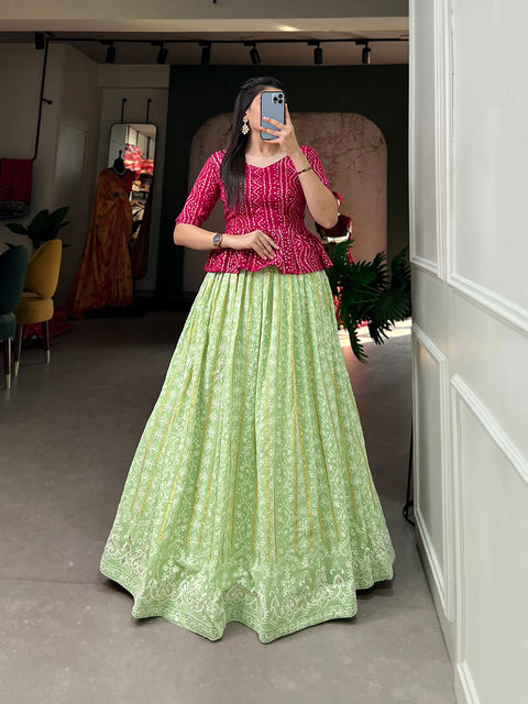 Glimmer a unique grace to your personality by donning this outstanding Pista lehenga made of georgette material embellished with lucknowi thread work all over For Women