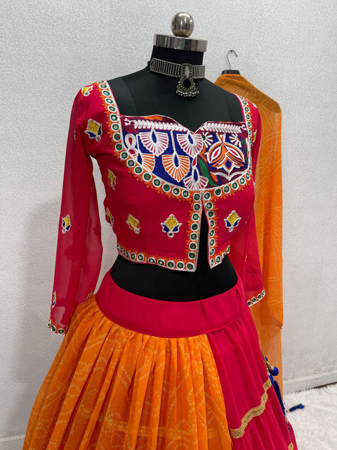 Orange Navratri Special Chine Stitch And Real Mirror Work Lehengas Choli With Dupatta