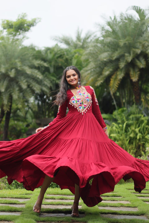 This Maroon Colored Attractive Partywear Gown will surely fetch you compliments for your rich sense of style