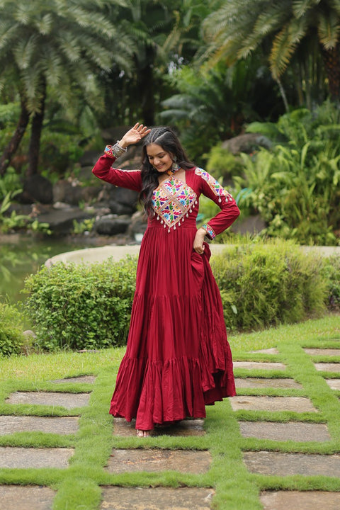 This Maroon Colored Attractive Partywear Gown will surely fetch you compliments for your rich sense of style