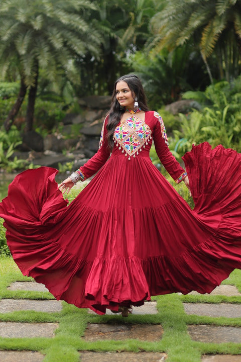 This Maroon Colored Attractive Partywear Gown will surely fetch you compliments for your rich sense of style