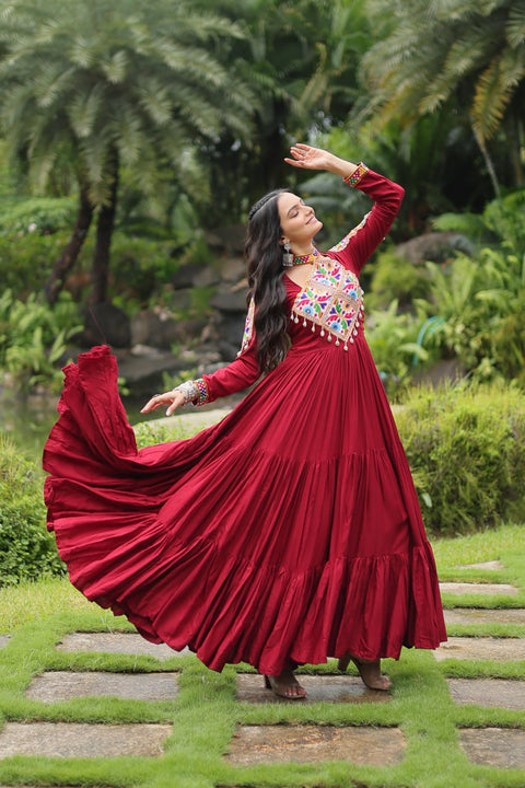 This Maroon Colored Attractive Partywear Gown will surely fetch you compliments for your rich sense of style