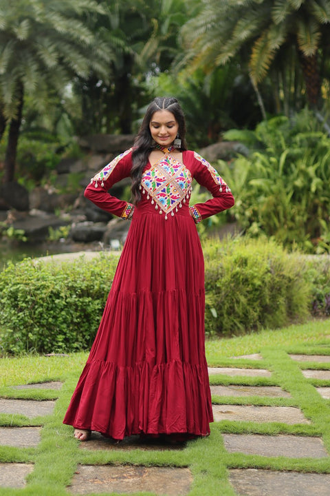 This Maroon Colored Attractive Partywear Gown will surely fetch you compliments for your rich sense of style