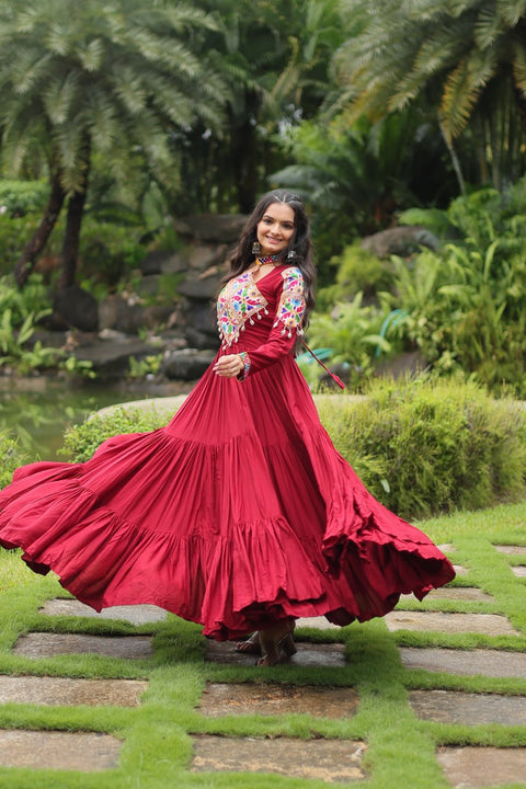 This Maroon Colored Attractive Partywear Gown will surely fetch you compliments for your rich sense of style