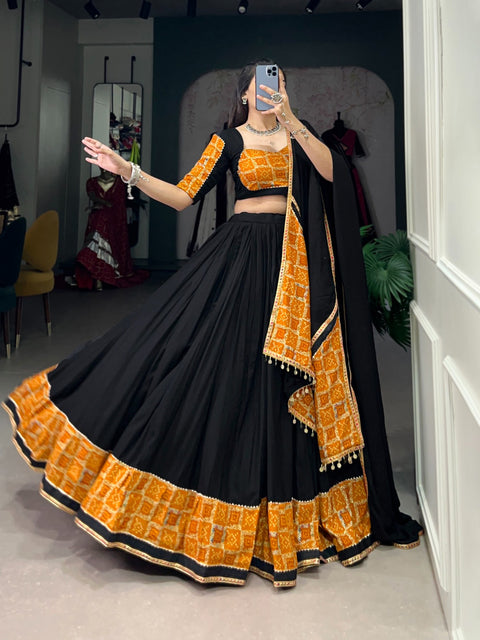 Black Elevate Your Navratri Look with Our Pure Rayon Printed Lehenga, Featuring Plain and Gota Patti Touch Up For Women