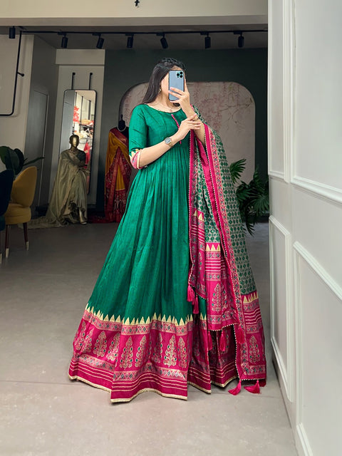 Green the center of attention with this Tusser silk designer gown for women