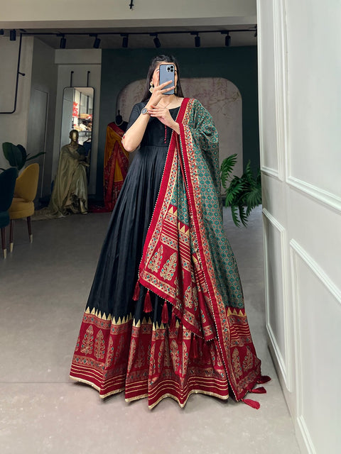 Black the center of attention with this Tusser silk designer gown for women