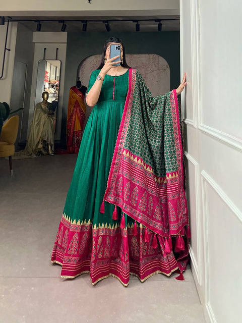 Green the center of attention with this Tusser silk designer gown for women