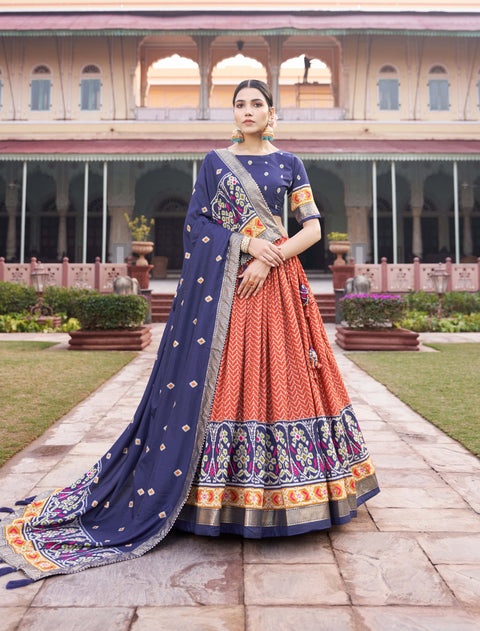 orange Step into the spotlight with confidence in our Tussar silk printed lehenga choli for women