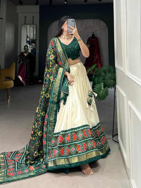 Green Wedding Grace in Patola Print lehenga choli for women in USA .