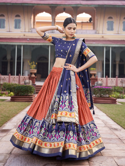 orange Step into the spotlight with confidence in our Tussar silk printed lehenga choli for women