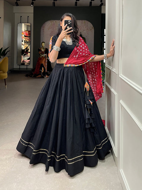 Give yourself quintessential look in navratri by wearing this  black classic lehenga choli crafted from the finest cotton, adorned with gamthi work blouse