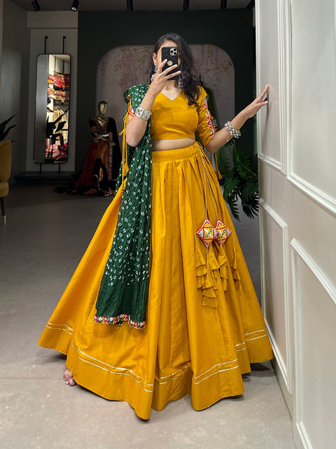 Yellow classic lehenga choli crafted from the finest cotton, adorned with gamthi work blouse