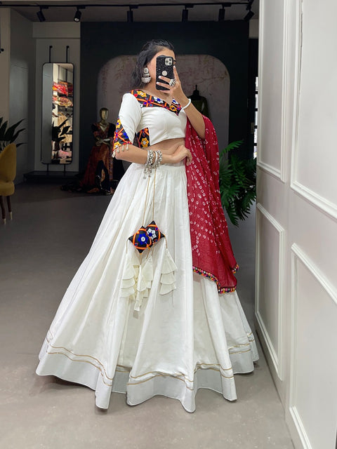 White classic lehenga choli crafted from the finest cotton, adorned with gamthi work blouse