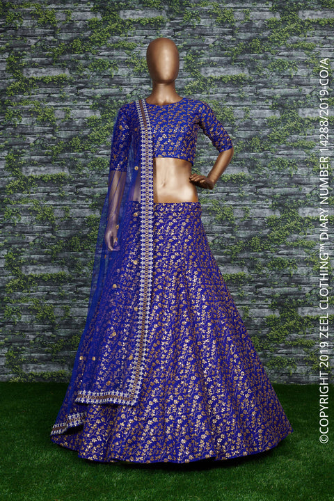 blue Raw silk lehenga with golden zari embroidered in vine pattern accentuated with golden sequins all over lehenga choli for women