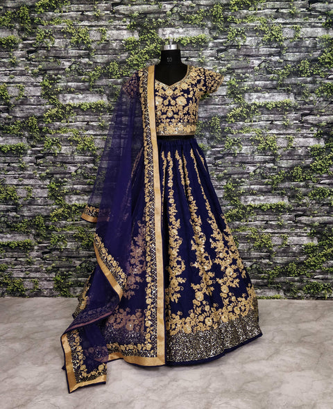 Give yourself an unique look by wearing this exquisite navy blue color silk lehenga set.