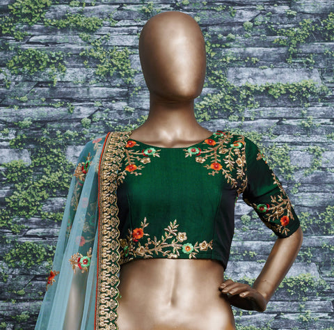 lehenga is prepared on a taffeta satin silk base in an eye-pleasing shade of dark green for women