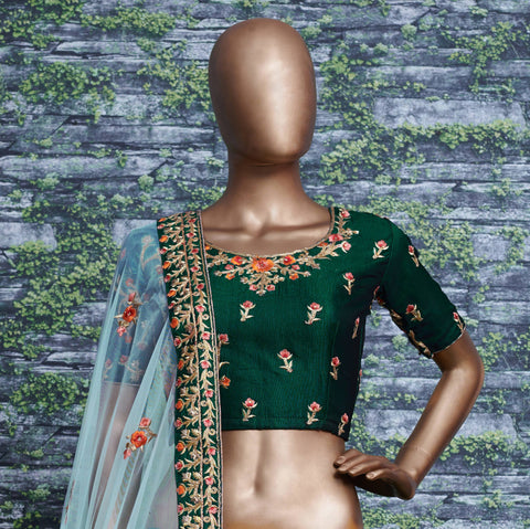 Adorn a simple yet elegant charm with this ensemble in an this dark green lehenga choli for women