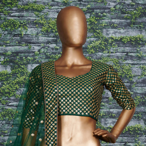 Green raw silk blouse adorned with gold sequin embroidery lehenga choli for women