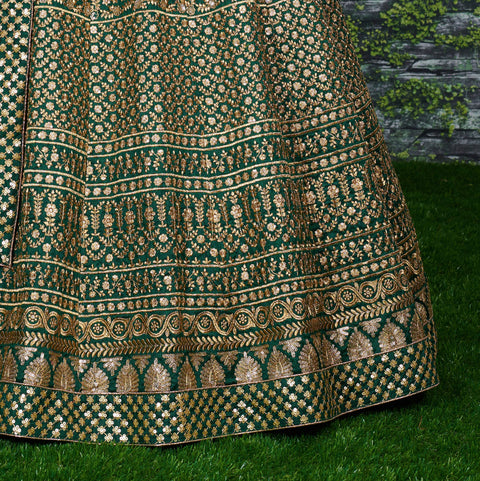 Green raw silk blouse adorned with gold sequin embroidery lehenga choli for women