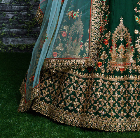 lehenga is prepared on a taffeta satin silk base in an eye-pleasing shade of dark green for women